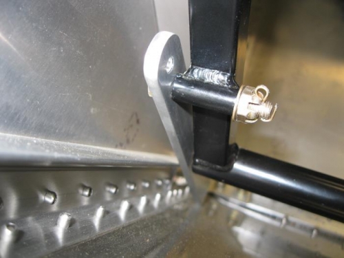 Welded tube drilled out with adjuster installed.