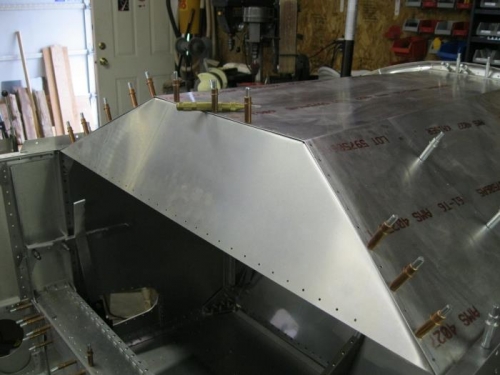 Glare-shield and panel clecoed.