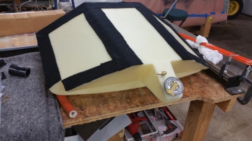 Fuel tank with felt attached.