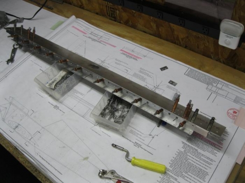 ready to rivet shear angle to spar carrythrough