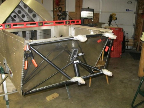 Engine mount clamped to the fuselage.