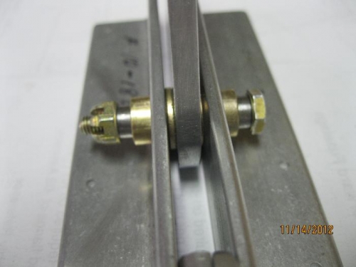 Steel bushings that need to be primed with epoxy chromate.