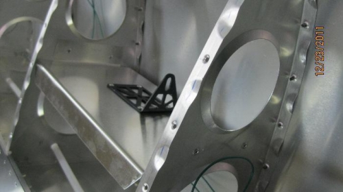 Skin off looking at light mount.