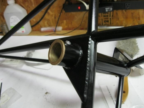 Bushings top and bottom with set screws.