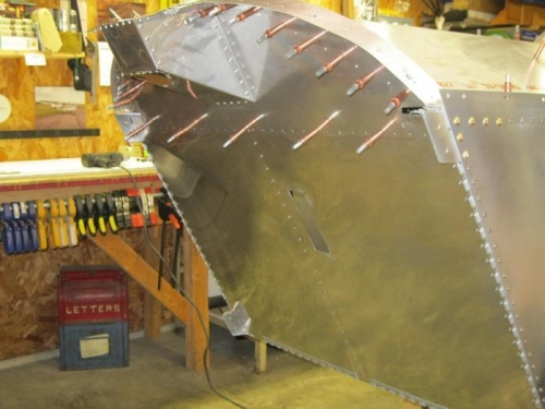 Firewall with cutout for steering linkage.