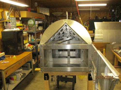 Front fuselage coming apart for deburring.