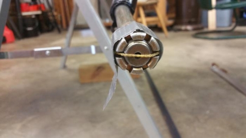 String stretched between each axle tip.