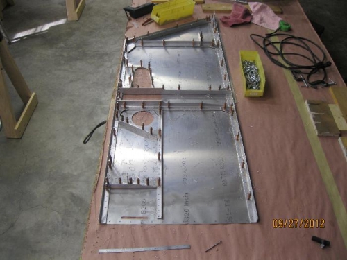 Right forward fuselage updrilled.