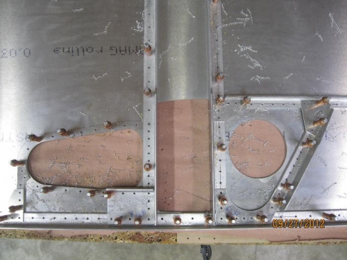 Right forward fuselage updrilled.