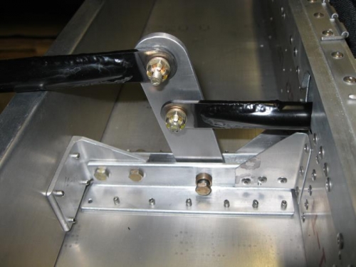 Idler on right and Elevator pushrod on left.