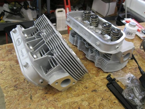 Cleaning burrs from new heads.