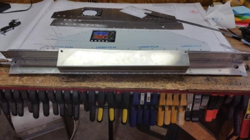 removable hinged cover for lower panel.