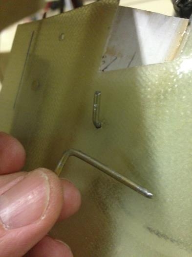Piano hinge pins in the alignment holes