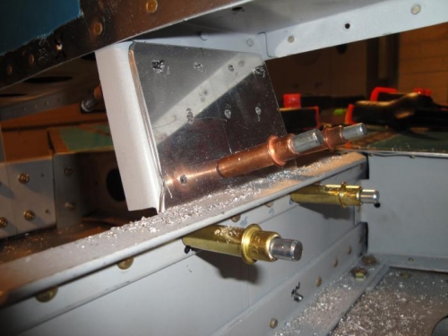 Matchdrilling the plate to the forward spar and spacer plate