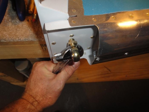 Installing the rod end bearings to the rudder