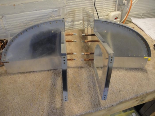 Mating the main structural ribs to the side sub-panels