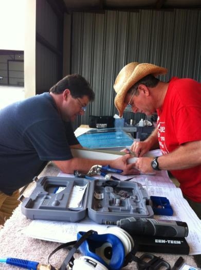 Tony Malley helping with initial trimming