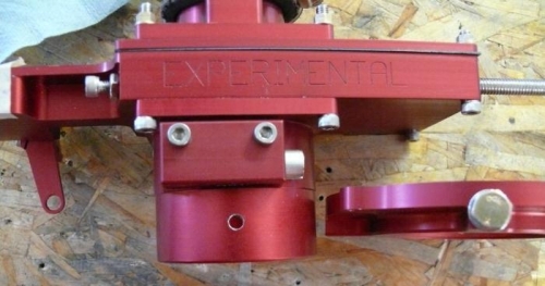 Air cleaner mounting hole drilled and tapped