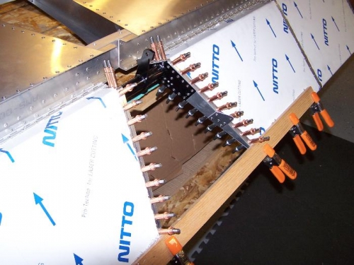 Underside showing trailing edge brace and leading edge surface that faces aft spar.