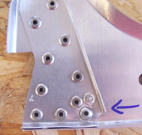 Bad Rivet lower R; two add'l rivets added.