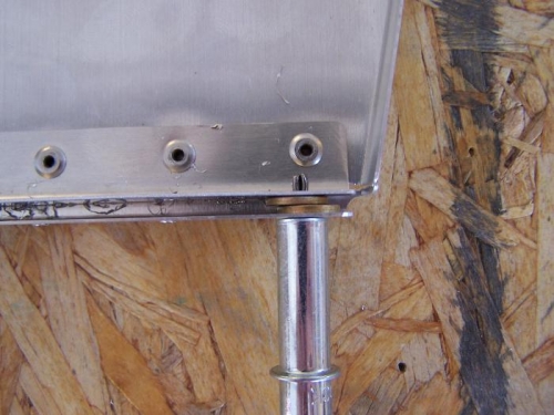 Used washers to space the trimmed portion to allow attach hole location.