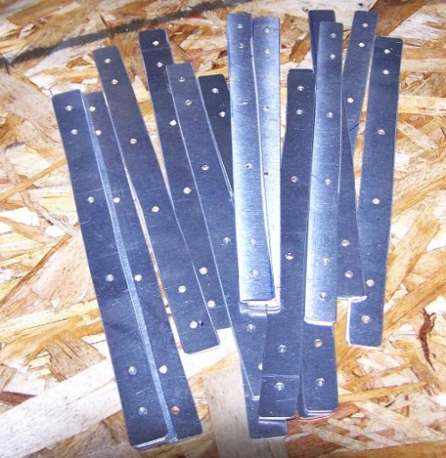 .032 stock drilled to match rib attach holes