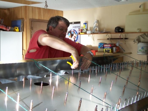 Me removing cleco's from lower spar cap