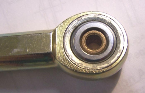 Reducer bushing installed in rod end