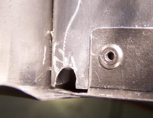 Cleaned-up (not final) relief around rib rivet interference