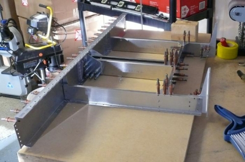 Subassembly Removed for Deburr & Riveting