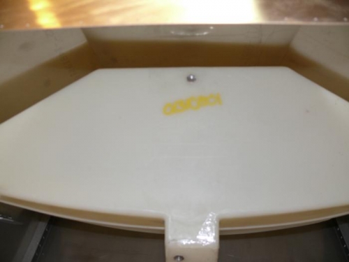 Panel at the top showing room behind tank