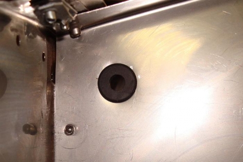 Grommet for fuel tank vent line; side of filler box