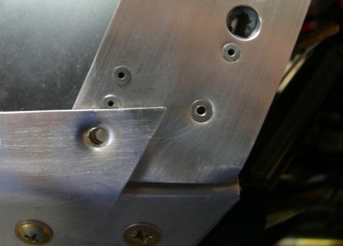 Nutplates installed lower sides of cowl bow