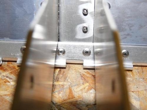 Lower 2 Rivets in Center are the Culprit