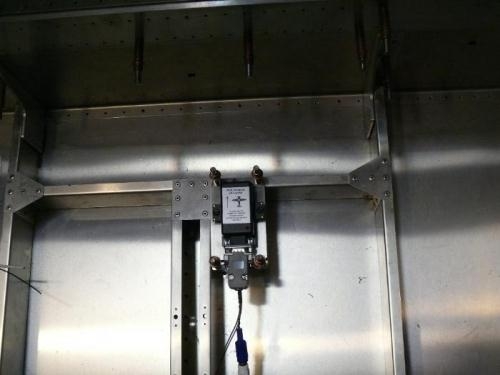 Positioned just to the right of centerline