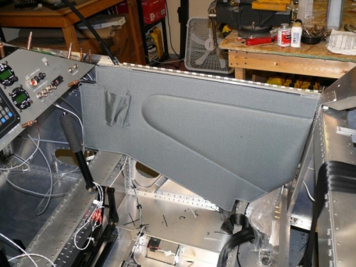 With upholstery panel in place