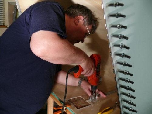 Me drilling the upper centerline hinge