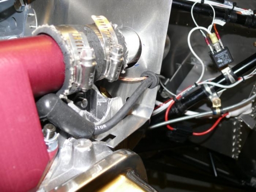 Routing of rear plugs to lower magnetron