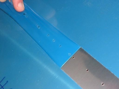 Peeling the acrylic away after melting lines with soldering iron