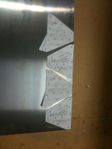 Bracket patterns ready to be adhered to the steel for cutting.