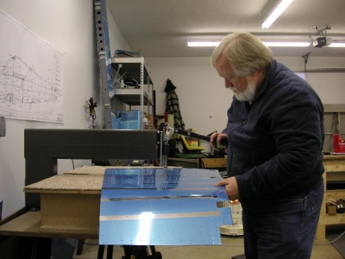 Dimpling rudder skins.