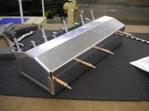 Ends riveted, ready to rivet the lid.