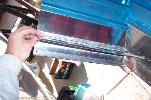 Attaching the adjustment plate to the seat back