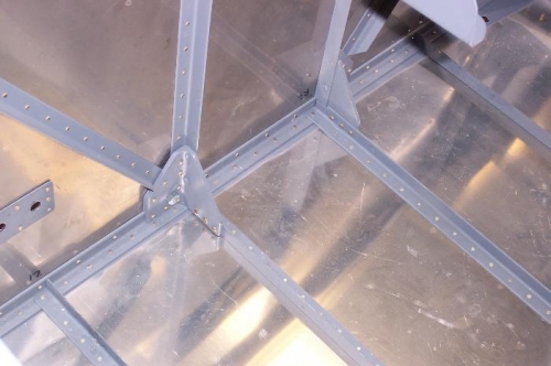Finished riveting the lower stiffeners.