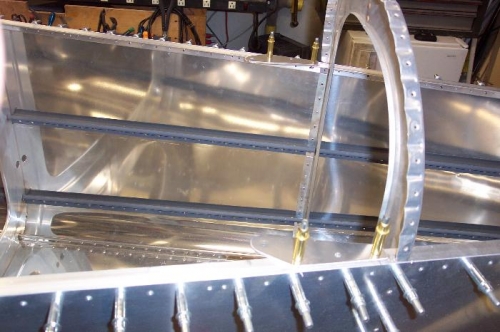 Shoulder seat belt brackets