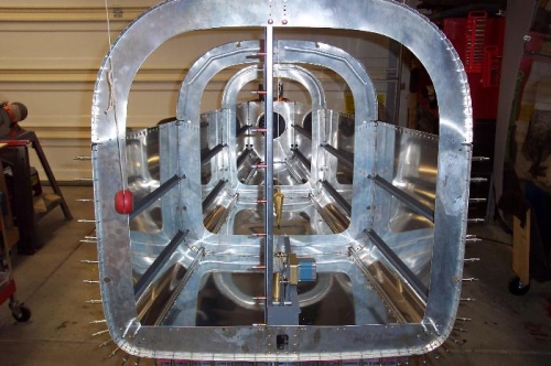 Front view, plumb bob is dead on.