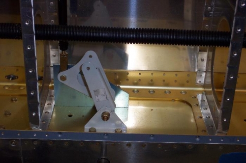 Alignment jig holds aileron in place while the aile position is checked.