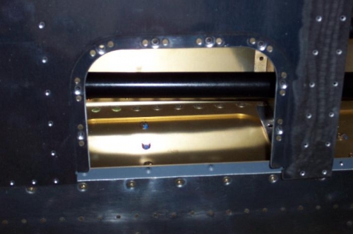 Access hatch nut plates are riveted in place.  (4/6)