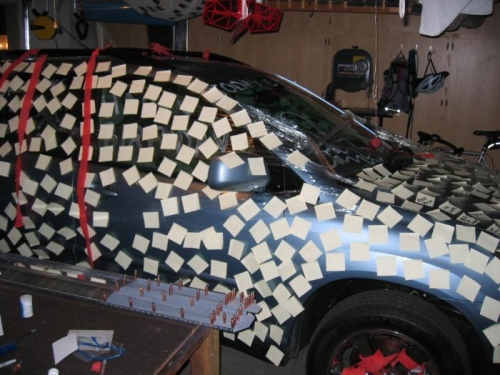 Wrapped in celophane and covered in Post-its!