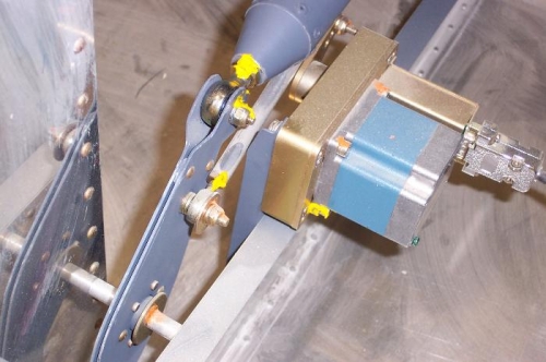 Forward side of elev pushrod installled and torque striped.